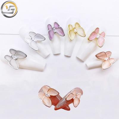 China Fashionable High Quality Nail Art Rhinestones For Nail Decoration Cat Eye Stone Butterfly Nail 3d Products for sale