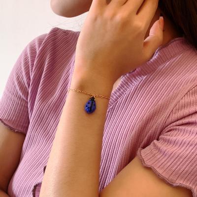 China Fashion Simple Creative Cute Ladybug Dangling Star Color Seven Color Glass Bracelet for sale