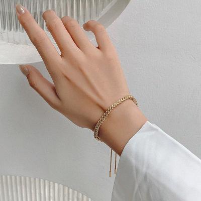 China CLASSIC Lucky Adjustable Trendy Custom Pull Woven Titanium Steel Gold Plated Designer Jewelry Bracelet for sale