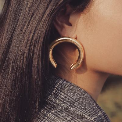 China FASHIONABLE Statement Gold Metal Crescent Iron Retro Simple Exaggerated Circle Earrings Big Metal Hollow for sale