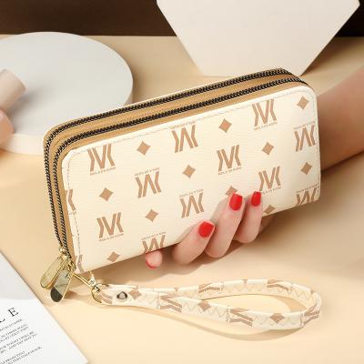 China Waterproof Cute 2021 Girls Korean Style Candy Color Green Leaf PU Long Cash Wallet Coin Clips Card Holder With Pendant for sale