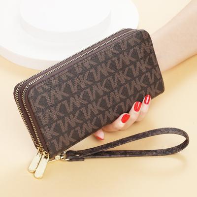 China Waterproof PU Girls 2021 Korean Style Cute Brown Long Cash Wallet Coin Clips Card Holder Zipper Purse for sale