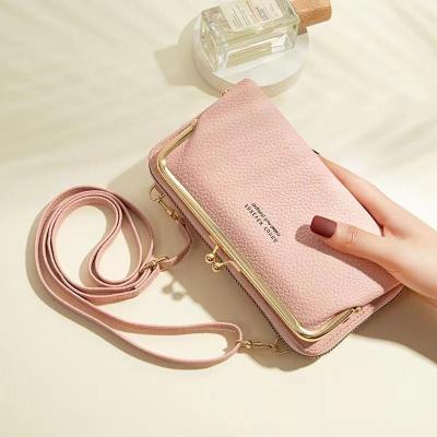 China Waterproof Cute 2021 Korean Style Girls Candy Color PU Macaron Long Cash Wallet Coin Clips Card Holder With Shoulder Strap for sale