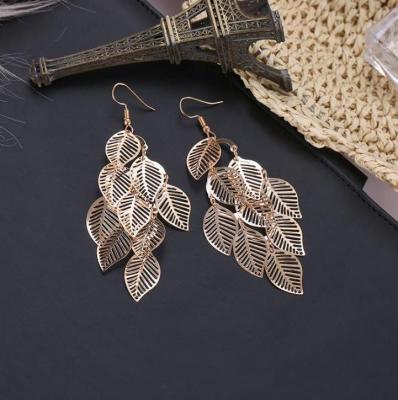 China Flower gold color casual/sporty hollow leaf drop long earrings pendientes jewelry wedding tassel dangle earrings for sale