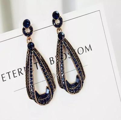 China Crystal Golden Metal Chain Dangle Earrings Women Personality Statement Casual/Sporty Drop Earrings for sale