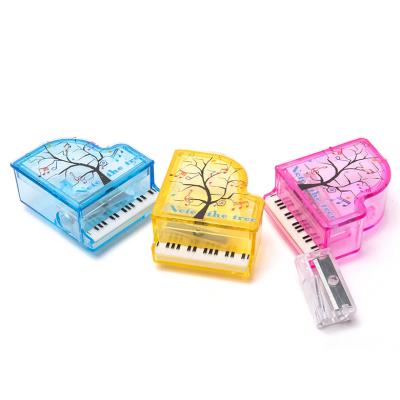 China wholesale patent 65Mn/PS baby pink material safe cosmetic cute classroom piano school children simple manganese steel child offered hole pencil sharpener for sale