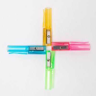 China Unique Design Transparent Custom Color Pencil Sharpener Pink Creative Pencil Sharpener With Pen Cap for sale