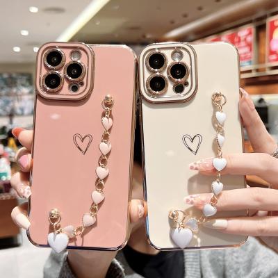 China DIAL Fashion Plating Love Heart Wrist Bracelets Phone Chain Case For iPhone 13 12 11 pro Max Side Printing Fundas for sale