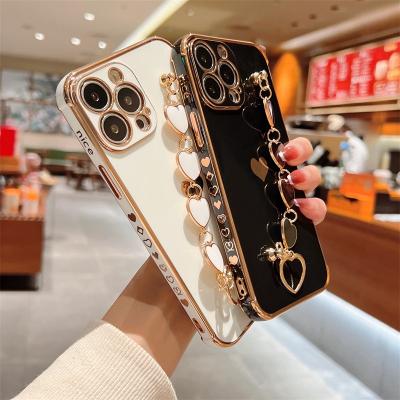 China Luxury Warm Waterproof Heart Side Plating Love Bracelet Case For iPhone 14 13 pro Max Heart Side Pattern Phone Cover 12 11 for sale