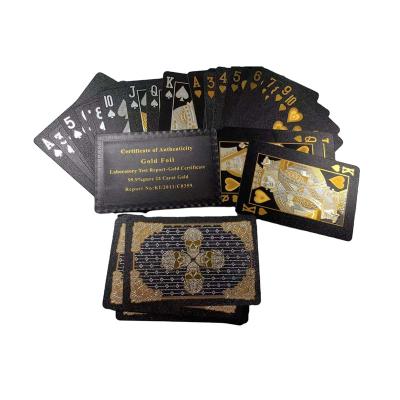 China Plastic PET Poker Cards Gold Foil Skulle Playing Cards Black Plastic for sale