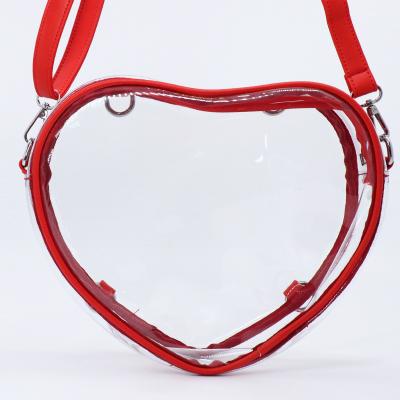 China Fashion Amazon PVC Heart Shaped Transparent Clutch Bag For Lady Custom Design Women Clear Shoulder Bag for sale