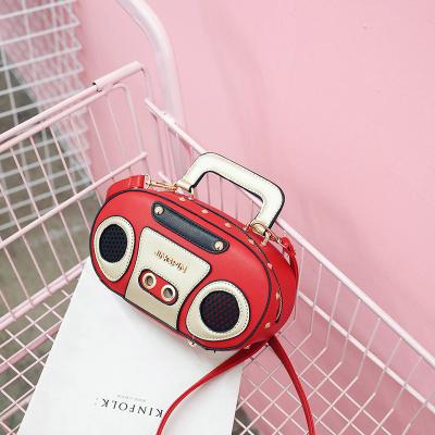 China European and American fashion radio shape shoulder bag rivet cross-body bag waterproof stereo unique women for sale