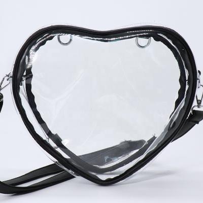 China Fashion Girls Fashion OEM ODM Shoulder Makeup PVC Plastic Clear Bags Custom Heart Shaped Cross - Body Purse for sale