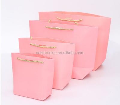 China Wholesale Recyclable Cheap Wholesale Custom Logo Pink Fancy Wedding Favor Paper Bag Luxury Mini Small Door Paper Gift Bag With Ribbon Handles for sale