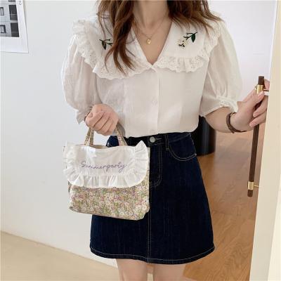 China Korean Chic Custom Made Softback Ins Embroidery Girl Cotton Handbag Wrinkled Edge Pattern Soft Floral Student Lunch Clutch for sale