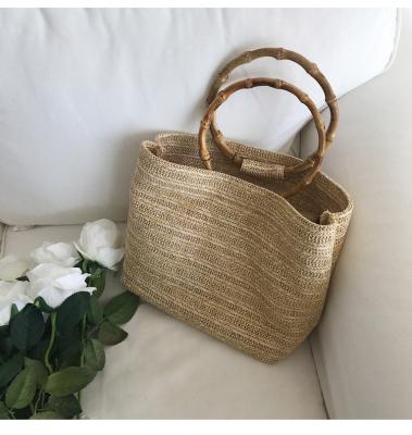 China 2018 Softback Ins Summer Fashion Beach New Tote Bag 2 in 1 Straw Bucket Bag With Bamboo Handles for sale