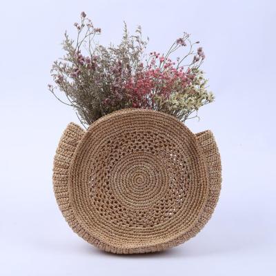 China Natural Handmade Raffia Softback Beach Straw Round Clutch Bag Customized Crochet Ladies Basket Handbag for sale