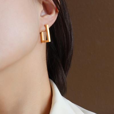 China 2021 FASHIONABLE Korean Fashion Trend Door Lettering Geometric Rectangular Earrings Titanium Steel Plated 18k Gold Cold Style Earrings for sale