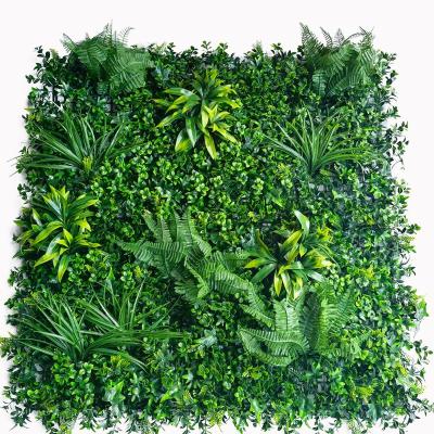 China 3D mov artificial grass herb artificial plant wall grass panels hot sale in Saudi Arabia for sale