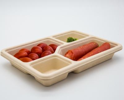 China 700ML Microwavable Disposable Food Canisters Biodegradable Catering Packaging Disposable 4 Compartment Lunch Box Tableware for sale