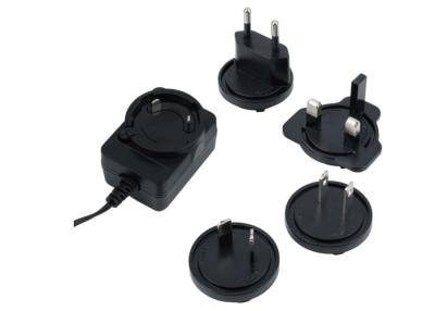 China Adaptador de pared de voltaje universal negro 12V Protección contra sobrecarga de salida en venta