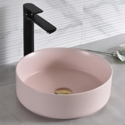 China Modern Ceramic Hotel Bathroom Table Top Pink Hand Wash Sink The Knock Counter Ware Color Sanitary Basin for sale