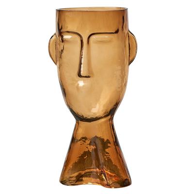 China 2021 Hot European Living Room Decorative Creative Faced Contemporary Amazon Art Deco Glass Vase for sale