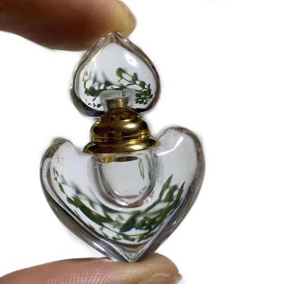 China China wholesale high quality natural heart shape quartz perfume bottle white essential oil crystal bottle for gift for sale