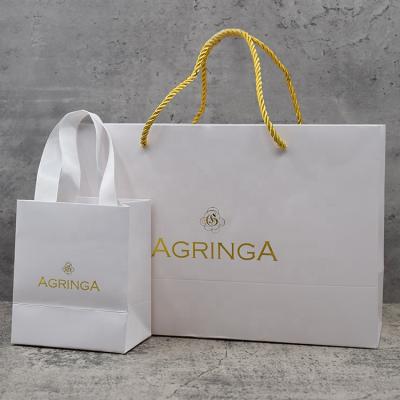 China Recyclable Customized Logo Print Luxury Cosmetic Jewelry Gift Shopping Paper Bag With Handle for sale