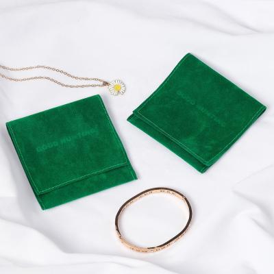 China Custom Embossed Dark Green Logo Luxury Envelope Flap Vintage Logo Earring Package Bag Suede Stainless Steel Jewelry Pouch Bag for sale