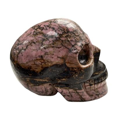 China Wholesale Natural Crystal Skulls Rhodonite Skulls Europe Quartz Crystal Carvings For Home Decoration for sale