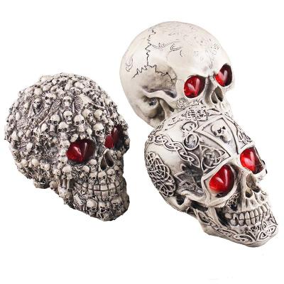 China non-toxic material & Good Wholesale OEM Resin Skull Head Toy With Light Painting Interior, Led Night Skull Head Light Toys for sale