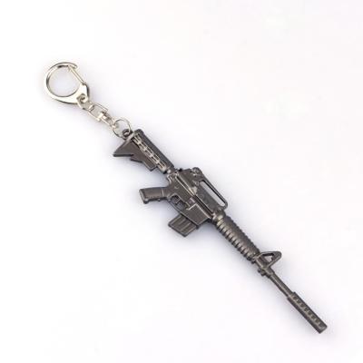 China non-toxic material & Good Painting Custom Mini Gun Weapon Key Chain For Sale 3D Metal Gun Key Chain Keychain for sale