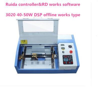 China General Use DIY Design Artwork Advertisement Mini Computer Control 3020 40/50W 3020 CO2 Laser Engraving Machine for sale