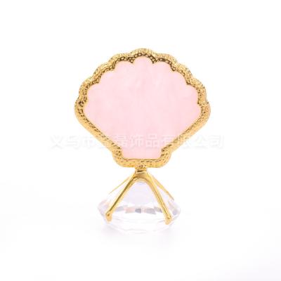 China Easy Apply Newest Gold Diamond Base Nail Display Stand Shell Shape Nail Display Gel Polish Nail Art Tool for sale