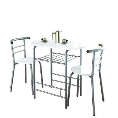 China Modern Modern White High Gloss Dining Table And 2 Chairs Set Metal Frame Kitchen for sale