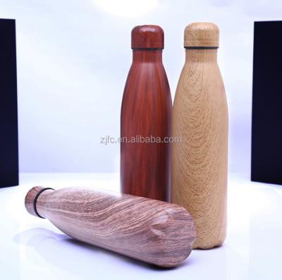 China Sustainable bpa free stainless steel vacuum insulated wood grain cola paint water bottle for sale