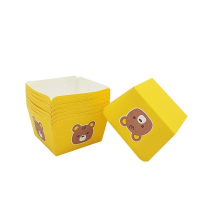 China Disposable Square Paper Cake Cup With Yellow Bear Pattern A Disposable Paper Cup For Baking Bread Used In An Oven for sale