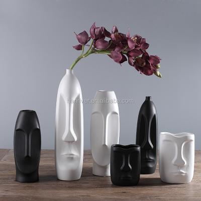 China Minimalist Custom Modern Nordic Unique Face Ceramic Porcelain Flower For Gift Decoration for sale