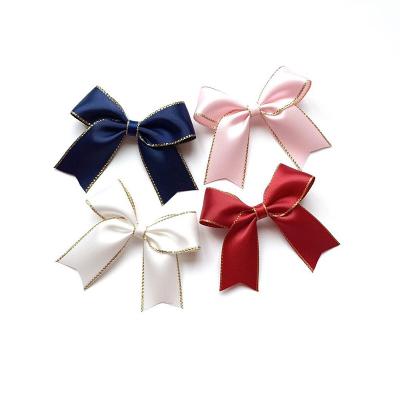 China Custom lgarment promotional high quality gift mini ribbon bows for sale