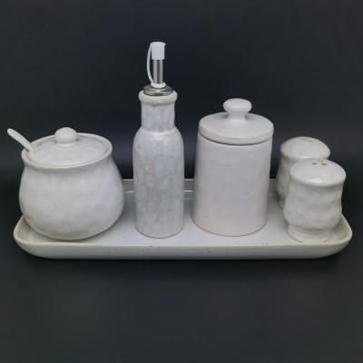 China OEM Pottery Condiment Set Porcelain Jar Custom Viable Condiment Jar Ceramic Spice Container Sets With Lids for sale