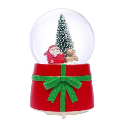 China Europe Christmas Tree Santa Claus Snow Globe 80mm 100mm With Music Lighting Spinning Snow For Kids Christmas Gift Wholesale for sale