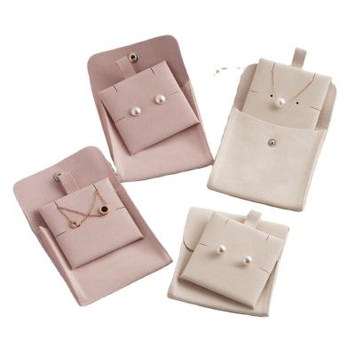 China 2022 Reusable Microfiber Jewelry Packaging Pouch Button Ring Earring Bracelet Necklace Instant Velvet Pouch Hot Selling Factory Price for sale