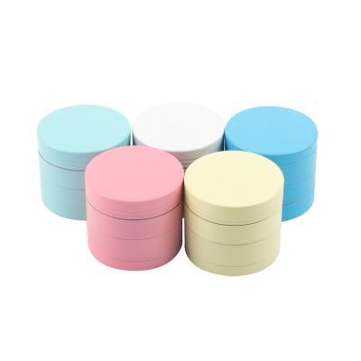 China Wholesale 40mm Zinc Alloy 50mm 55mm 63mm 4 Layer Luminous Matte Soft Rubber Silicone Herb Grinder Glowing In The Dark for sale