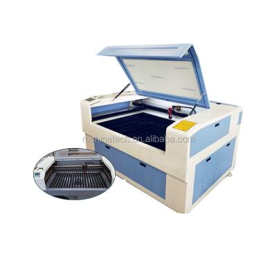 China Laser CUTTING New 6090 Laser Cutting Machine With Dsp Controller for sale