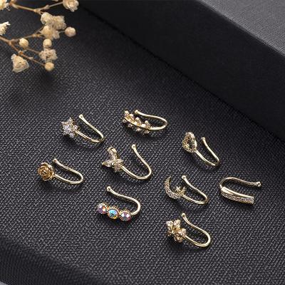 China Hot Sale 9Pcs/Set Clear Zircon Flower Heart Punk Punk U Shape Fake Nose Rings For Women Non Piercing Nose Cuff for sale