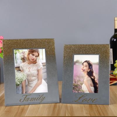 China Modern Simplicity New Gold Glitter Sparkle Crystal Glass Frame Sale Wedding Silver And Angry Frame Can Be Customized 4*6 5*7*8 8*1 for sale