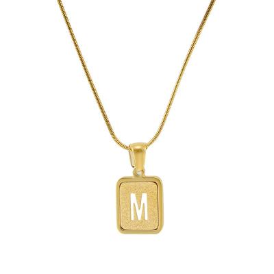 China Eco friendly Summer European and American Titanium Steel Hollow 26 English Letter Pendant 18K Stainless Steel Gold Sand Letter Necklace for sale