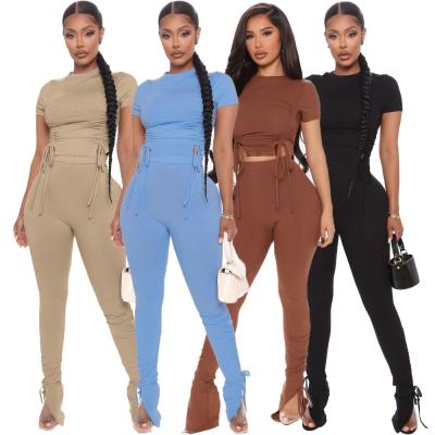 China 2021 Autumn solid color viable strappy two piece bodycon yoga top set 4 colors plus size strappy two piece crop top for sale