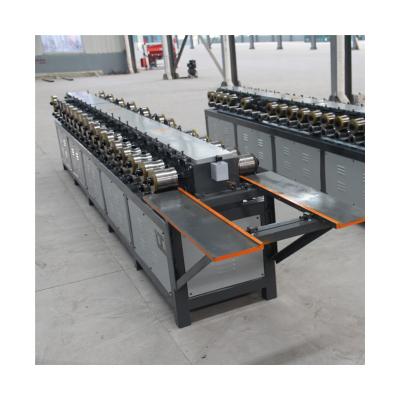 China Easy Operation Roller Shutter Door Sheet Slats Roll Forming Machine Equipment For Shutter Door Making for sale